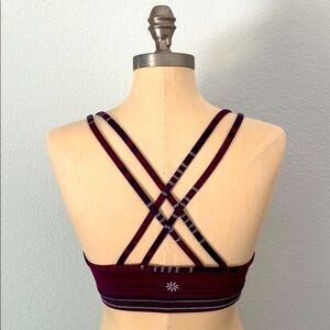 Athleta women’s purple striped sports bra